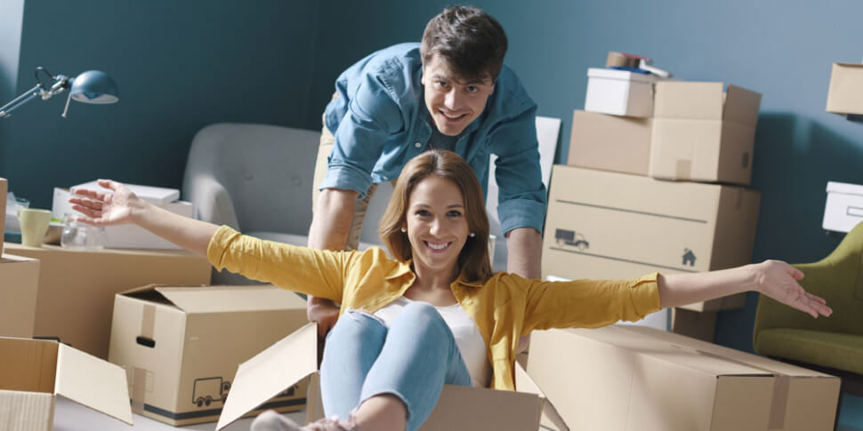 Couple with moving boxes