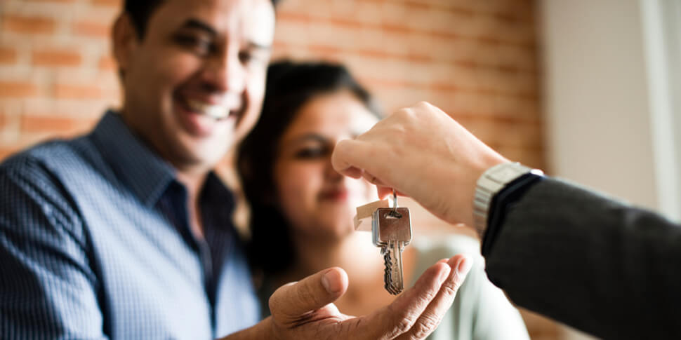 Couple getting house keys
